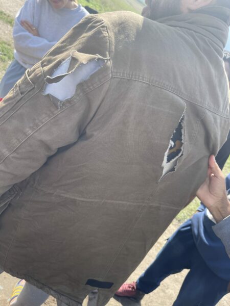 Hungarian border officer slashed man's jacket with knife.